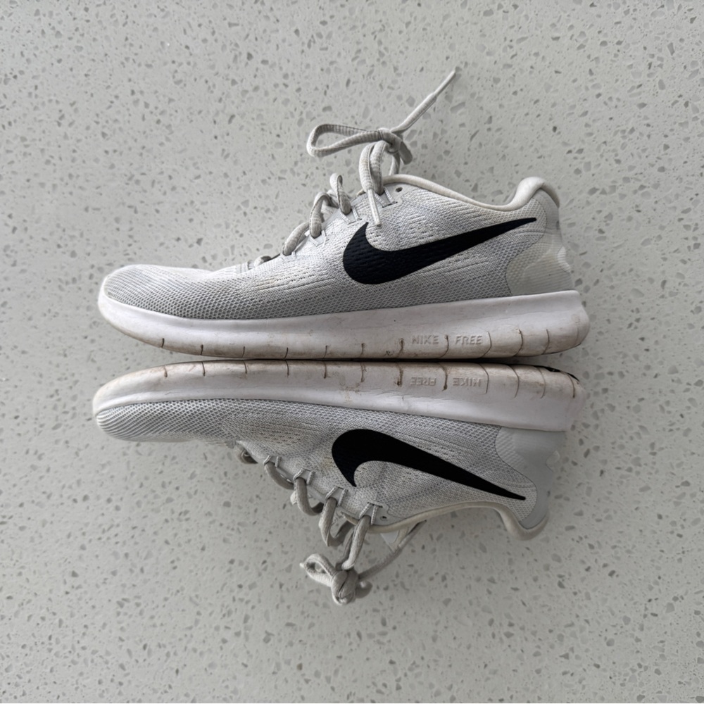 Nike Light Gray Running Shoes / Sneakers with Black Swoosh